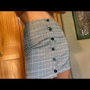 Plaid button up mini skirt